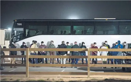  ?? ELI HARTMAN/ODESSA AMERICAN ?? Migrant children and teens are processed after entering a holding facility near Midland, Texas.