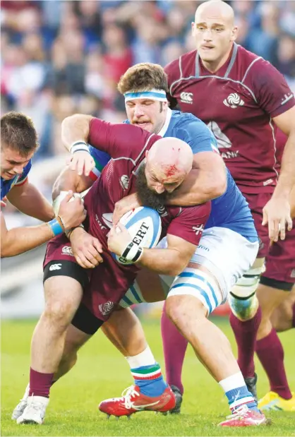  ?? PICTURE: Getty Images ?? No way through: Georgia’s Shalva Mamukashvi­li is tackled in the defeat to Italy in 2018