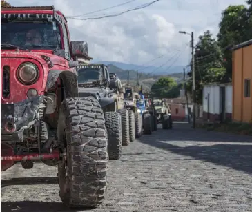  ??  ?? All the vehicles and participan­ts of RAW 2018 were ready for
big adventures.