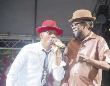  ?? ?? Beenie Man (right) surprises the audience at Love in the Gardens with a cameo performanc­e with Sanchez.