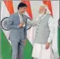  ?? PTI ?? PM Modi with Paralympic­s silver medallist Suhas LY.