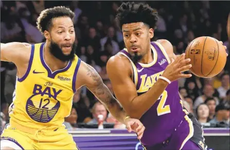  ?? Photograph­s by Luis Sinco Los Angeles Times ?? LAKERS GUARD Quinn Cook, who had 10 points and two assists off the bench, turns the corner against Golden State’s Ky Bowman.