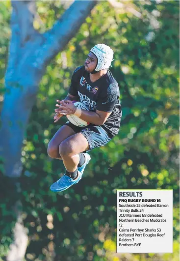  ?? Picture: JUSTIN BRIERTY ?? FLYING HIGH: Crusader Thomas Fletcher takes the ball against Barron Trinity Bulls.