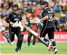  ?? GETTY IMAGES ?? Devon Conway (left) and Henry Nicholls run between the wickets during the big win against Bangladesh on Saturday.