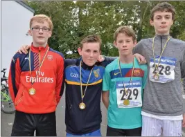  ?? Photos at bottom of page by Fergus Dennehy ?? Sean Horan, Ciarán Brosnan, Cormac Lynch and Liam McGee pictured after they completed the CBS The Green 5km run.