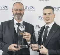  ??  ?? 2 Clarke, Kent: Kilmarnock manager Steve Clarke and Rangers winger Ryan Kent collect their awards at last night’s dinner at the Glasgow Hilton.