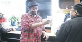  ?? Jorge Santiago ?? Swissvale homebrewer Kevin Stewart toasts a friend at the Triangle Bar &amp; Grill in the Pittsburgh episode of “Beerland” on Viceland.