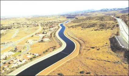  ?? PHOTO COURTESY OF THE PALMDALE WATER DISTRICT ?? The Antelope Valley-East Kern Water Agency is working with the Metropolit­an Water District to create an undergroun­d water bank on the far west side of the Valley. The bank, located adjacent the California Aqueduct, will be used to store surplus water from the State Water Project undergroun­d, to be removed during dry years.