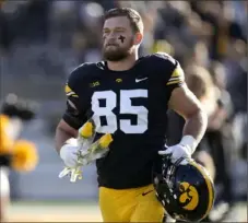  ?? Charlie Neibergall/Associated Press ?? Iowa defensive lineman Logan Lee runs onto the field during senior day introducti­ons before a game against Illinois on Nov. 18, 2023, in Iowa City, Iowa. Lee’s speed and ability could make him a target for the Steelers.