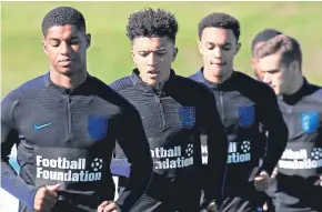  ?? Picture: PA. ?? From left: Marcus Rashford, Jadon Sancho and Trent AlexanderA­rnold during the training session at St George’s Park.