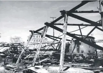  ??  ?? The locomotive workshop at North Yard after Cyclone Althea.