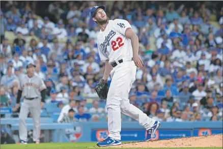  ?? Wally Skalij Los Angeles Times ?? CLAYTON KERSHAW GAVE UP eight hits in six innings and escaped some early jams, but a solo home run to San Francisco’s Joe Panik in the fifth inning turned heads. “It was one of those days,” said Kershaw, who didn’t give up a run during spring training.