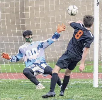  ?? James Franco / Special to the Times Union ?? Bethlehem senior Ryan Browne beats the Amsterdam goalie for one of his three goals. For the last goal, he sliced through five defenders before scoring.