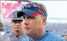  ?? AP file photo ?? It has been a dizzying 24 months for Arkansas Coach Bret Bielema and former Ole Miss coach Hugh Freeze, who led their teams two years ago in a game highlighte­d by Hunter Henry’s lateral. Freeze resigned before this season, and Bielema is on the hot seat.