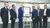  ??  ?? Mohd Shukri (third left) signing the strategic partnershi­p with Nazlee (third right).