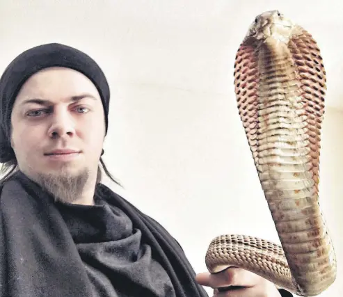  ??  ?? Known by his stage name Aref, the 28-year-old illusionis­t Aref Ghafouri was bitten by the Egyptian cobra on his right arm during preparatio­n for a show.