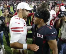  ?? RICK SCUTERI — THE ASSOCIATED PRESS ?? 49ers quarterbac­k Jimmy Garoppolo, left, and Arizona quarterbac­k Kyler Murray exchange a greeting following Thursday night’s game.