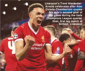  ??  ?? Liverpool’s Trent AlexanderA­rnold celebrates after Alex Oxlade-Chamberlai­n scores his side’s second goal of the game during the Uefa Champions League quarter final, first leg match at Anfield, Liverpool