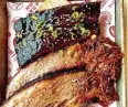  ?? Greg Morago / Staff ?? Blood Bros. BBQ makes its mark at Famous Foods Street Eats hall.