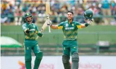  ?? — Reuters ?? South Africa’s Reeza Hendricks (R) celebrates his century next to his team-mate Jean-paul Duminy.