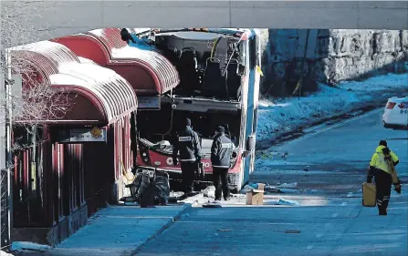  ?? JUSTIN TANG THE CANADIAN PRESS ?? The Transporta­tion Safety Board said it is not investigat­ing an Ottawa bus crash as the agency only probes marine, pipeline, rail and air incidents.