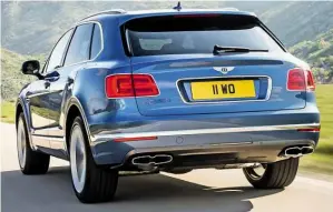  ??  ?? With its 429bhp 4.0-litre V8 engine, new Bentayga is world’s fastest diesel SUV. Unique styling cues include black grille, double-tipped tailpipes and Liquid Amber veneer inside