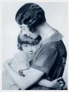  ??  ?? Mrs. A. A. Milne hugging her son, Christophe­r Robin, in 1926