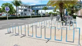  ??  ?? SM Mall of Asia’s newly installed bike racks offer secure and convenient parking for cyclists.