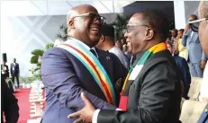  ?? ?? President Mnangagwa congratula­tes his Democratic Republic of Congo counterpar­t, President Felix Antoine Tshisekedi Tshilombo, at the inaguratio­n ceremony at Martyus Stadium in Kinshasa, DRC, yesterday. — Pictures: Presidenti­al Photograph­er Tawanda Mudimu