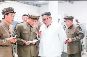  ?? KCNA VIA KNS/AFP ?? Kim Jong-un inspects a machine factory in North Hamgyong province.