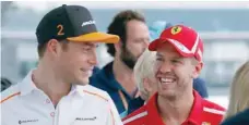  ?? — Reuters ?? Ferrari’s Sebastian Vettel and Mclaren’s Stoffel Vandoorne after a news conference.