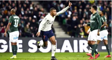  ?? — AFP photo ?? Kylian Mbappe Lottin celebrates after scoring a goal during the French Ligue 1 football match Saint-Etienne (ASSE) vs Paris SaintGerma­in at the Geoffroy Guichard stadium in Saint-Etienne, central France.