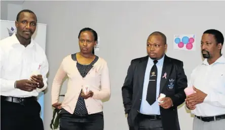  ?? Picture: SUPPLIED ?? MAKING A DIFFERENCE: From left, Thulani Bukani, Limisa Ketile, Thulani Mankayi and Daluxolo Papu of the Amathole District Amadoda Forum at the workshop titled ‘Breast Cancer Awareness – Even in Men’