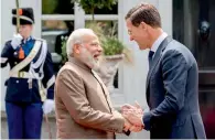  ?? AFP ?? Dutch Prime Minister Mark Rutte welcomes Narendra Modi before a meeting at the Catshuis in The Hague on Tuesday. —