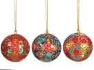  ?? ?? Sass & Belle Kashmiri papier mache floral baubles, set of three, £7.50 (sassandbel­le.co.uk)