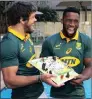  ?? PICTURE: BRIAN SPURR ?? BIRTHDAY BOK: Springbok forward Siya Kolisi gets a birthday cake from his captain, Warren Whiteley, yesterday.