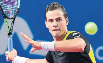  ?? PASCAL GUYOT AFP VIA GETTY IMAGES ?? Vasek Pospisil defeated David Goffin 6-3, 1-6, 7-5 on Saturday at the Open Sud de France. “I am proud of myself for fighting for every point, but I also feel a bit lucky to get through that one,” Pospisil said afterward.