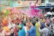  ?? PTI ?? BJP workers celebrate the party's victory in the Assam assembly elections in Guwahati in May 2016