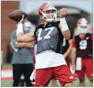  ?? NWA Democrat-Gazette/ANDY SHUPE ?? Arkansas quarterbac­k Nick Starkel threw three touchdown passes in Saturday’s second major scrimmage of training camp, drawing praise from Coach Chad Morris. “I thought Nick Starkel probably had one of his better days,” Morris said. “That was good to see.”