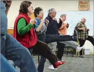  ?? DANA JENSEN/THE DAY ?? People participat­e in a Karate-Do class with sensei Ralph Batty Jr., not shown, at the Groton Senior Center on Dec. 18. The Karate-Do class is one of the new classes offered at the center for younger, more active seniors.