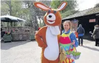  ??  ?? ●●The Easter Bunny with Hannah Saunders from the St Ann’s Hospice at last year’s event