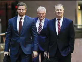  ?? AP PHOTO/JOSHUA A. BICKEL, FILE ?? Former Ohio Republican Party Chairman Matt Borges, right, walks toward Potter Stewart U.S. Courthouse with his attorneys Todd Long, left, and Karl Schneider, center, before jury selection in his federal trial, Jan. 20, in Cincinnati, Ohio.