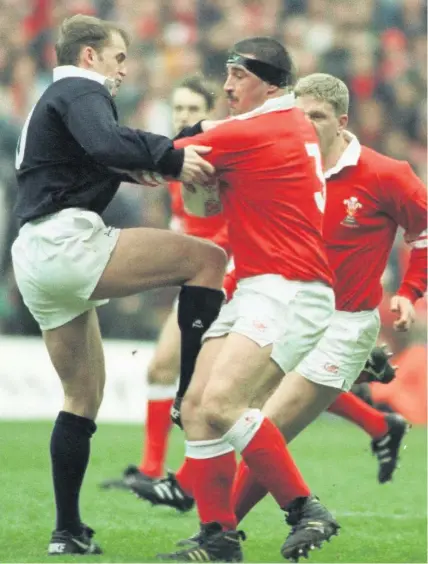  ??  ?? Wales’s John Davies takes on Gregor Townsend – now Scotland’s coach – in the 1996 Five Nations.