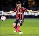  ?? CURTIS COMPTON / CCOMPTON@AJC. COM ?? “You haven’t seen my potential yet,” says Pity Martinez. Martinez, acquired for a reported $15 million from River Plate in his native Argentina, is coming off a frustratin­g match.