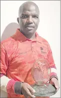  ?? (Courtesy Pics) ?? Second-time defending champion of the Previc Golf Challange Mbuso Mdluli pictured with his trophy.