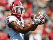  ?? CURTIS COMPTON / CCOMPTON@AJC.COM ?? Wide receiver Terry Godwin warms up before Saturday’s 41-17 victory over South Carolina in the Bulldogs’ first SEC game of the season.