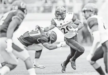  ?? JOHN HEFTI, USA TODAY SPORTS ?? San Diego State’s Rashaad Penny (20) was Mountain West special-teams player of the year.