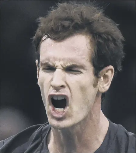  ?? Picture: Getty ?? Andy Murray yells in frustratio­n as the match against Novak Djokovic slips away from him in Paris last night