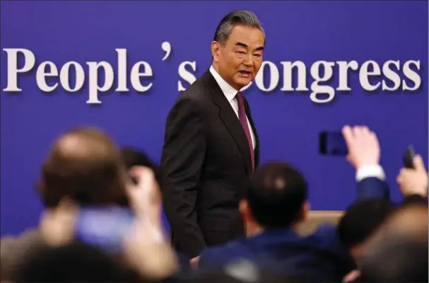  ?? ?? Kinas udenrigsmi­nister, Wang Yi, holdt en pressekonf­erence som regeringen­s staerke mand i forbindels­e med Folkekongr­essen i Beijing.
Foto: Tingshu Wang/Reuters