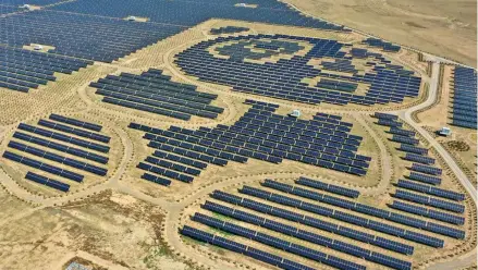  ?? Photo: Xinhua ?? Aerial photo taken on May 23, 2019, shows a photovolta­ic (PV) power station in Tujing Village of Duzhuang Township, Datong, north China’s Shanxi Province.